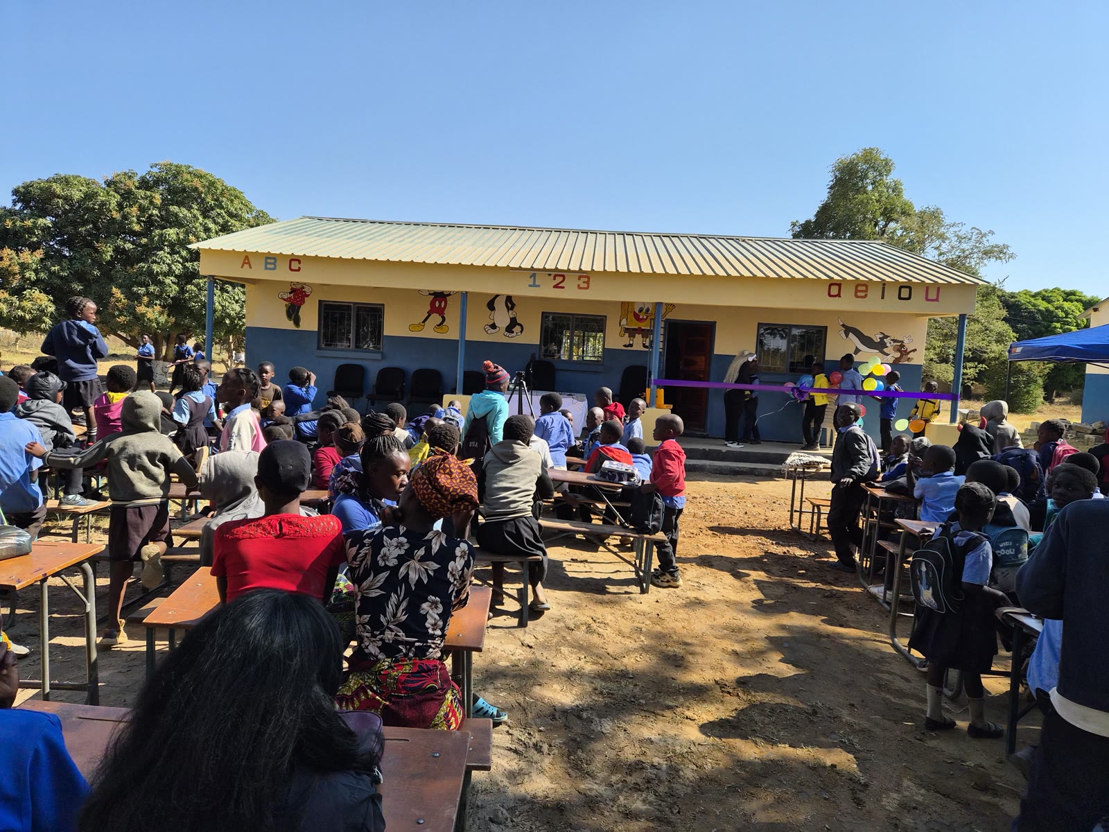 A crowd gathered for the opening of the new Maano ECE classroom block